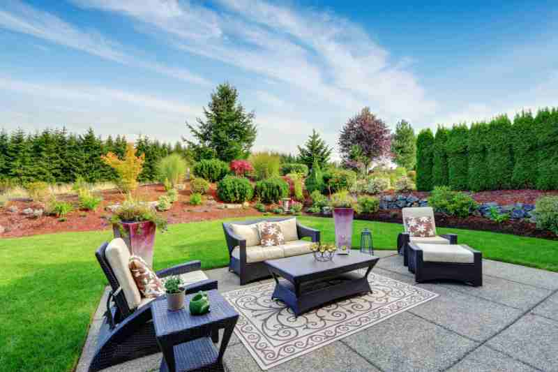 outdoor patio with manicured lawn